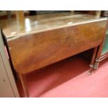 An early 19th century mahogany Pembroke table,