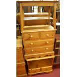 A small modern pine chest of two short over two long drawers,