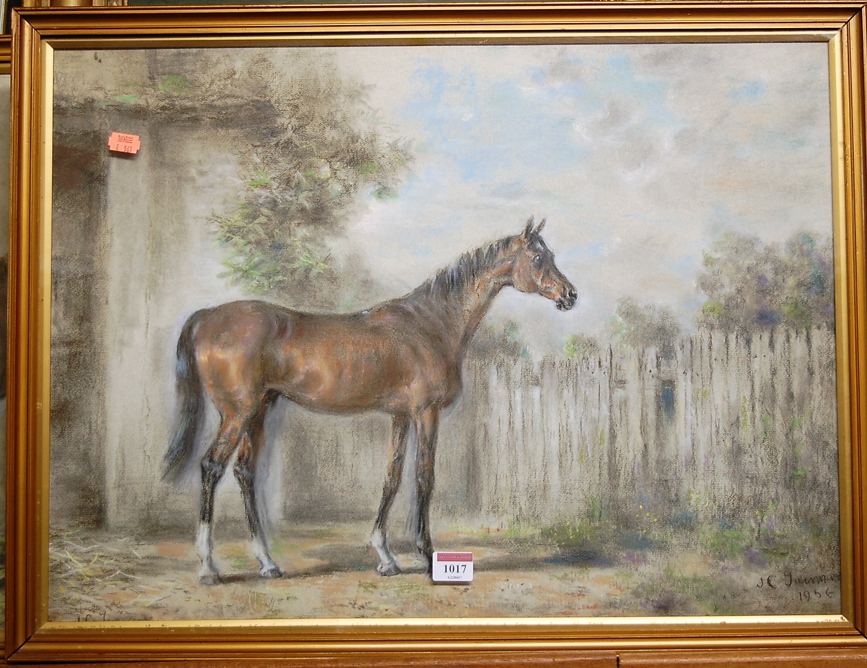 JCT - Bay thoroughbred in his stable, pastel; and one other by the artist of a bay in a stable yard,