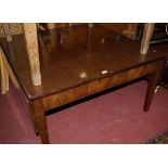 A low mahogany dropflap occasional table