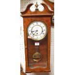 A Comitti of London reproduction walnut cased Vienna type wall clock,