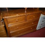 A modern beech chest of two short over two long drawers, w.