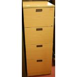 A modern laminate four drawer office filing cabinet