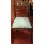 A 19th century mahogany and brass inlaid barback single dining chair