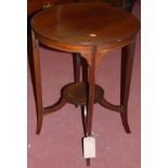 An Edwardian walnut and chequer strung circular two-tier occasional table