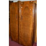 An Art Deco figured walnut and crossbanded double door wardrobe, w.