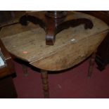 A 19th century provincial elm dropflap kitchen table