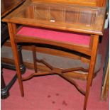 An Edwardian mahogany and boxwood strung glazed hinge-top bijouterie table,