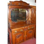 An Art Nouveau walnut mirrorback sideboard, w.