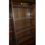 A 1930s oak freestanding open bookshelf of small proportions, w.61.