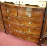 A 19th century mahogany bowfront chest of two short over three long drawers, w.