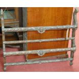 An early 20th century carved oak two tier hanging plate-rack