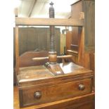 An early 19th century fruitwood table top book press,