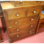 A Victorian mahogany round cornered chest of two short over three long drawers