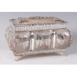 A continental silver box, the hinged cover finely chased with fruiting vines,