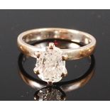 An 18ct white gold diamond solitaire ring, the oval cut claw set diamond weighing approx 1.