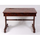 An early Victorian rosewood writing table,