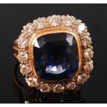 An 18ct gold, sapphire and diamond set ring,