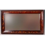 An 18th century Dutch walnut and floral marquetry inlaid wall mirror,