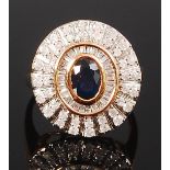 A continental yellow metal, sapphire and diamond dress ring,