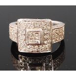 An Art Deco platinum and diamond set dress ring,