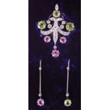 A cased Edwardian pendant with matching ear pendants, set with stones in the Suffragette colours,