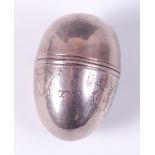 A mid-18th century silver nutmeg grater, of egg shape, with engraved monogrammed dedication,