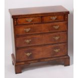 A walnut bachelors chest, in the early 18th century style,