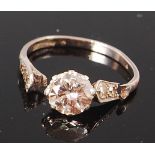 A platinum and diamond solitaire ring, the claw set brilliant weighing approx 1.