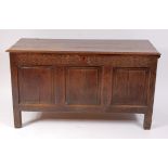 A circa 1700 joined oak three panel coffer, having steel loop hinges,