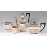 A late Victorian silver four piece tea and coffee service, comprising; teapot, coffee pot,