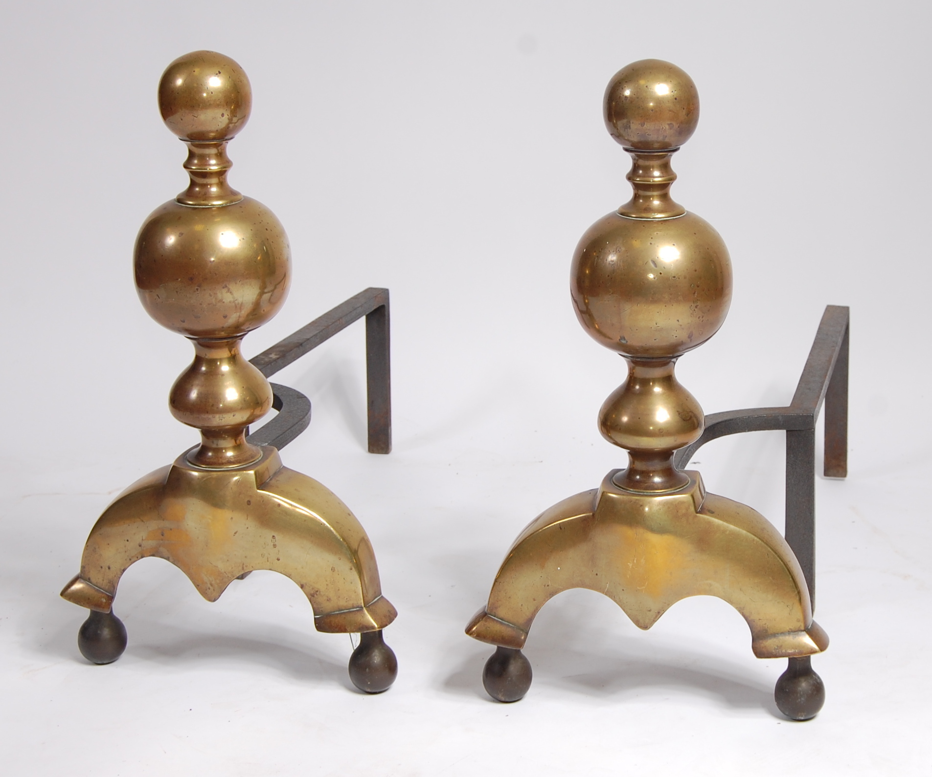 A pair of 19th century brass and iron andirons, of good size, possibly Dutch,