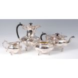 A George V silver four piece tea and coffee service, immaculate and possibly unused,