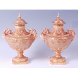 A pair of late 19th century Worcester porcelain pedestal vases and covers,