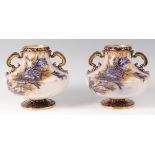 A pair of Wiltshaw & Robinson Carltonware pedestal vases,