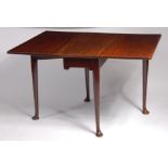 *A George III mahogany padfoot dining table, having square fall leaves on turned gatelegs, w.