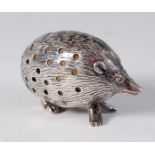 An Edwardian silver novelty pin cushion, in the form of a hedgehog, markers mark worn,