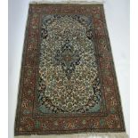 A Persian woollen Tabriz rug,