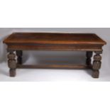 An antique joined oak refectory table, in the Elizabethan style,