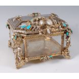 A continental silver gilt, semi-precious and diamond set rock crystal Historismus casket,