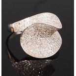 A contemporary 14ct white gold diamond dress ring,