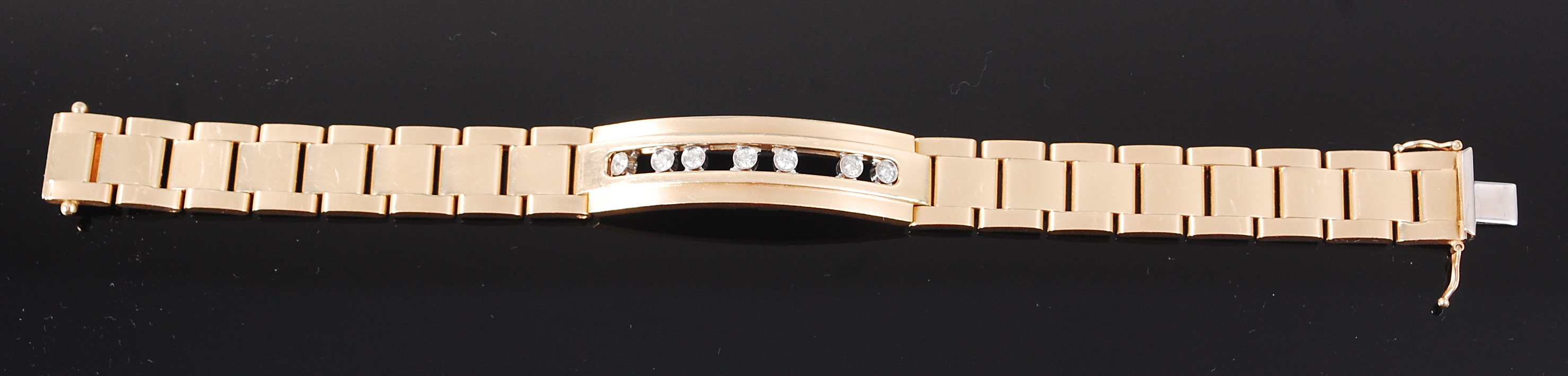 An Italian 14ct gold and diamond set bracelet,