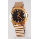 A Bucherer 18ct gold cased gents automatic wristwatch, having signed black dial, sweep seconds hand,