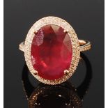 A 14ct gold, ruby and diamond set dress ring,