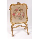A 19th century Rococo Revival giltwood and gesso fire screen,