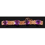 An 18ct gold expanding chainlink and amethyst set bracelet,