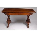 *An early Victorian rosewood sofa table, having twin frieze drawers,
