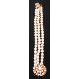 A 9ct gold cultured pearl triple string bracelet, having 9ct gold,