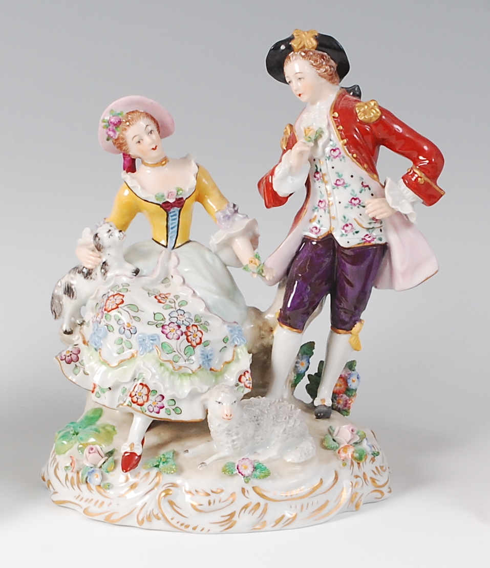 An early 20th century Sitzendorf porcelain figure group,