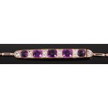 An Edwardian gilt metal, amethyst and white sapphire set bracelet,